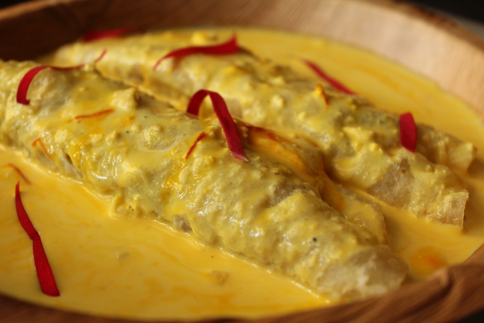 Surti Obbattu with Fruit and Nut Pooris in Saffron Milk